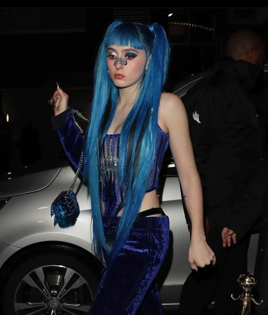 'The Secret' Jivomir Domoustchiev vegan vinyl luxury purse bag Ashnikko wearing Clear Blue vinyl studded bag at Brit awards by Jivomir Domoustchiev